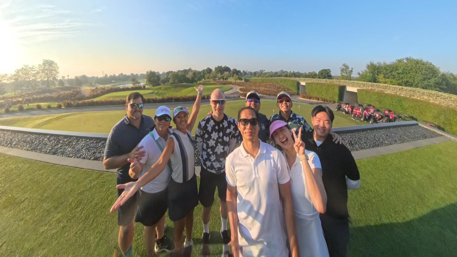 The Eggyolk crew at sunrise on the practice green